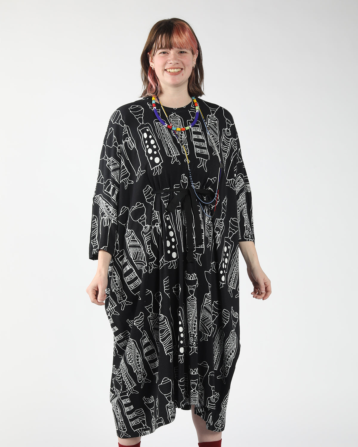 model wearing bold print confortable oversized flattering dress