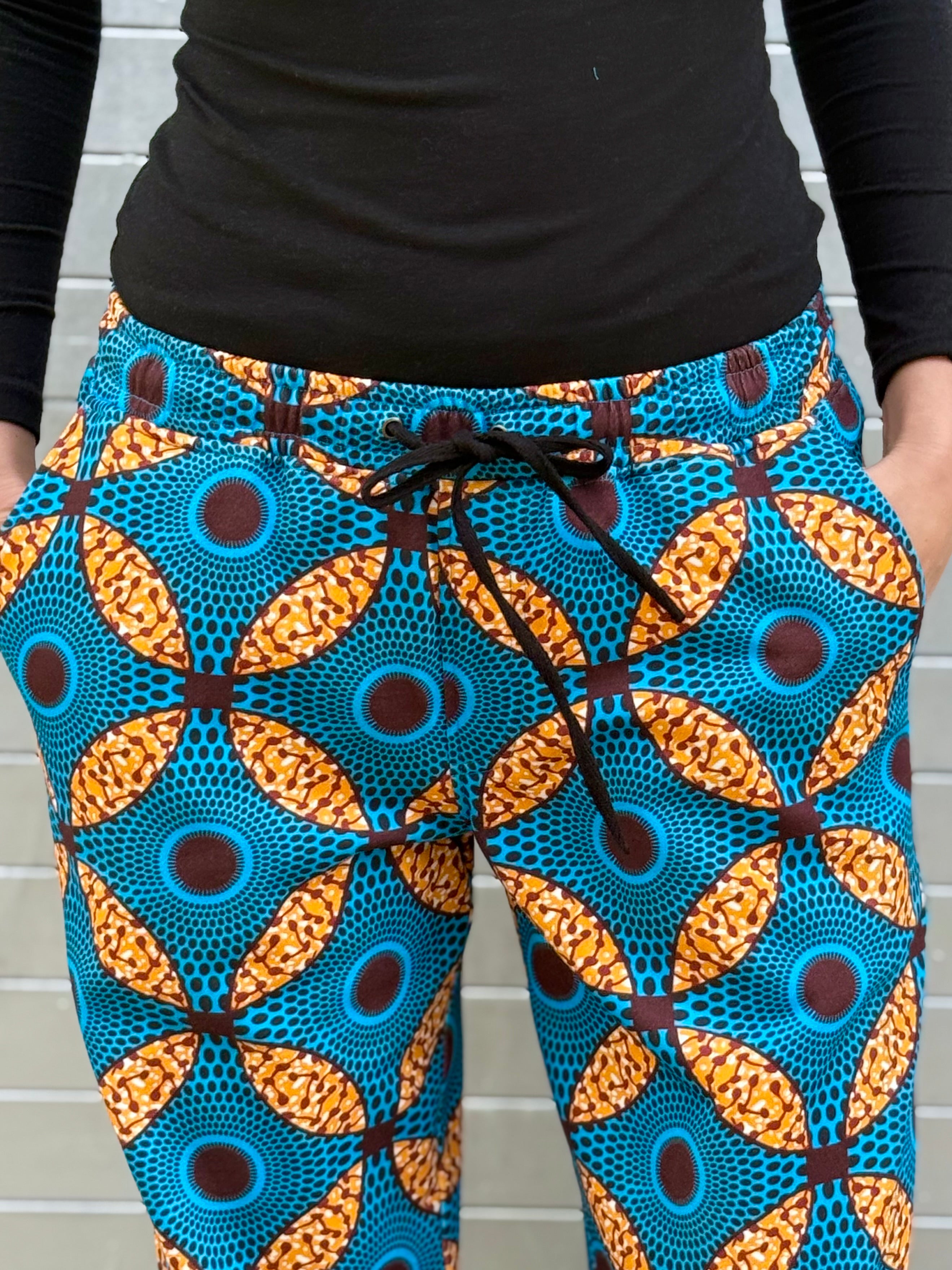 Close-up of the waistband and drawstring detail of the Ìmọ̀lẹ̀ Blue Sweat Pants, emphasizing organic cotton texture and artisan print precision. Designed for comfort, style, and sustainability.