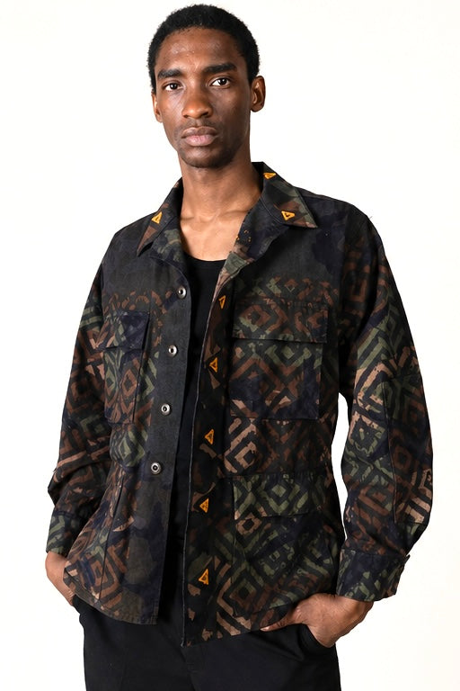 Exclusive reworked military jacket featuring earthy Natural dye (recycled iron + raw sugar), subtle geometric patterning, and artisan mirror embroidery