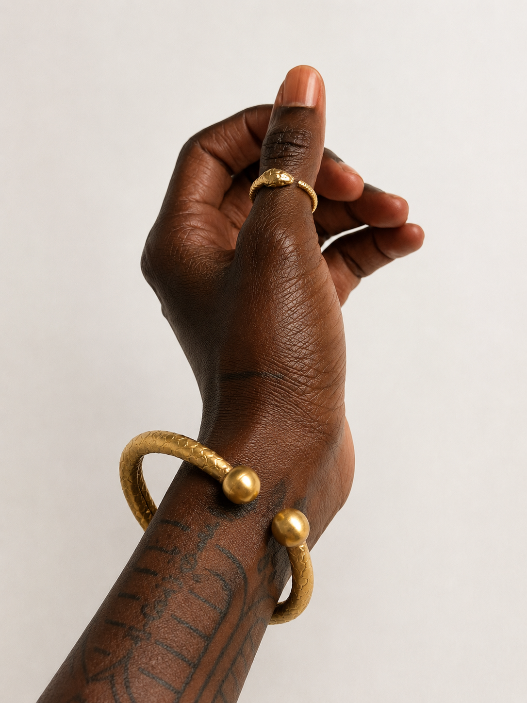 Serpent bangles