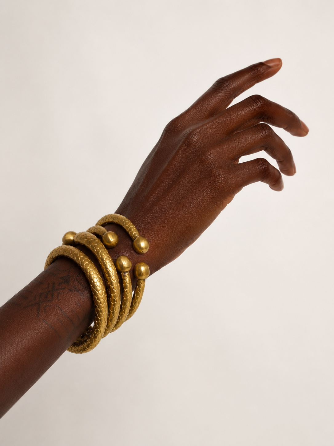 Serpent bangles