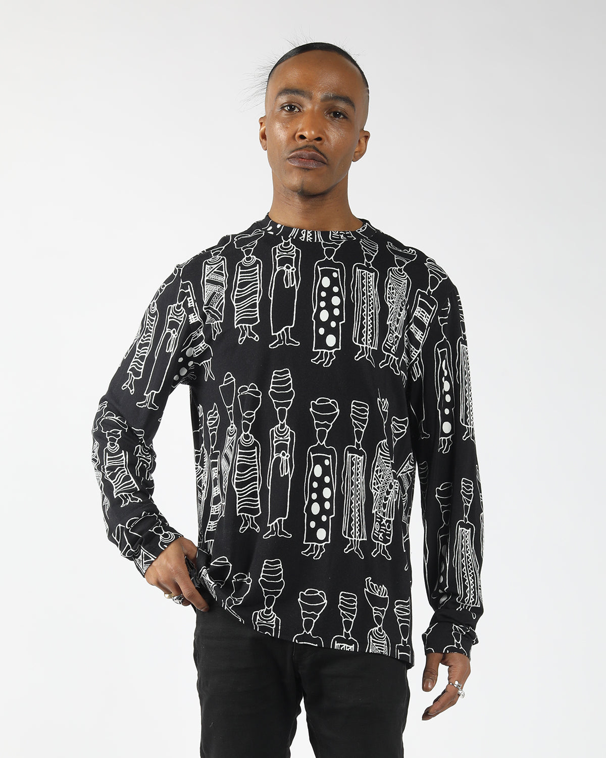 Unisex long sleeve shirt featuring hand-drawn heritage symbols in bold allover print