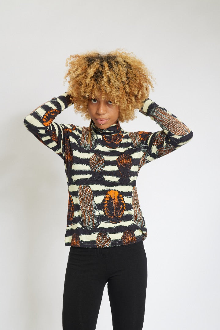 stylish bamboo braids hairstyle printed turtleneck front view