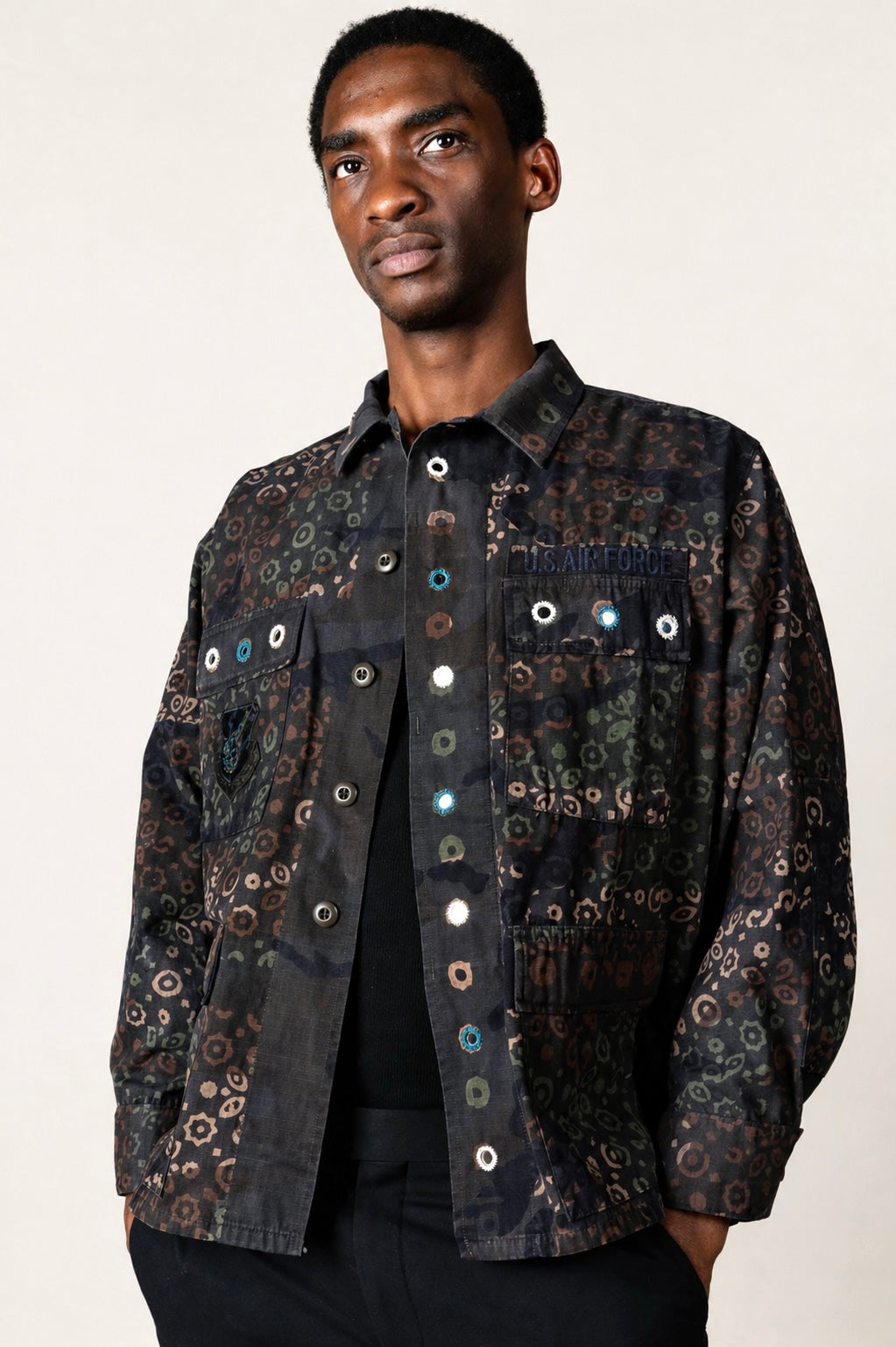 One-of-one vintage army jacket featuring tonal camouflage, natural iron dye process, and artisan mirror embroidery