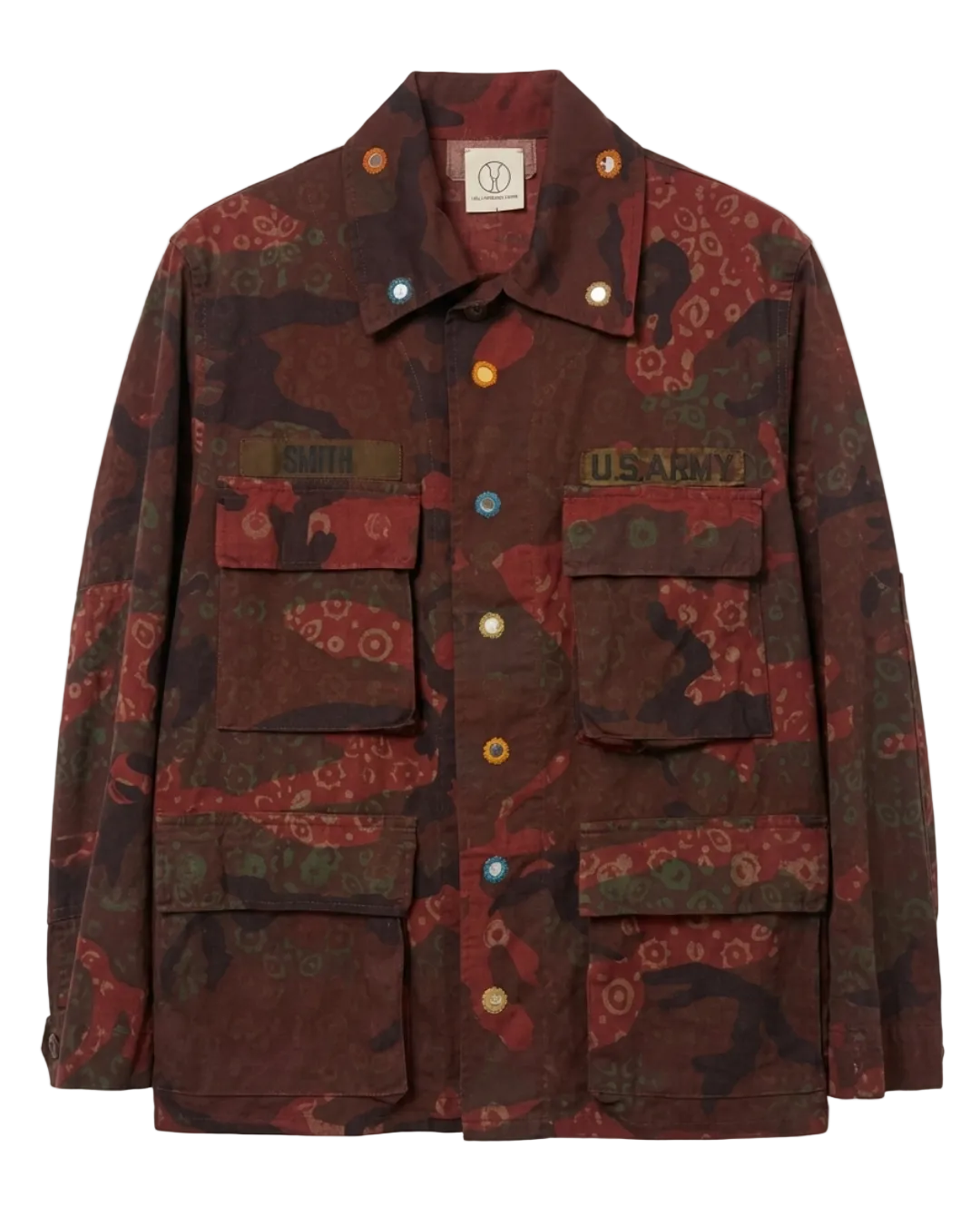 Exclusive reworked military jacket featuring earthy rust dye, subtle geometric patterning, and artisan mirror embroidery