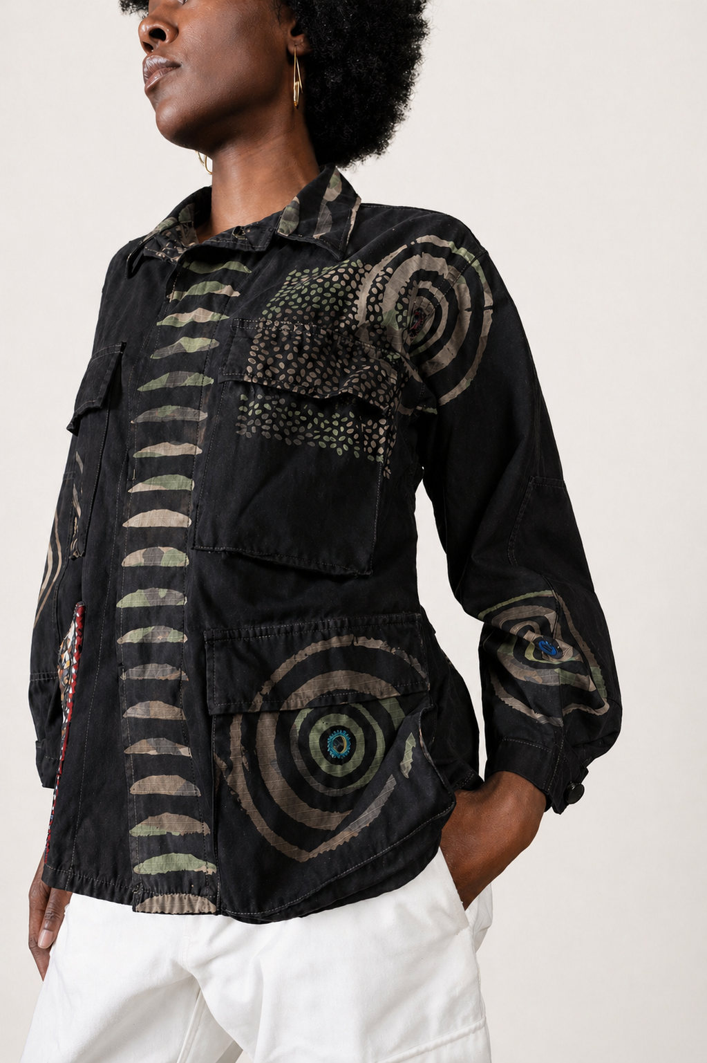 One-of-one vintage army jacket featuring tonal camouflage, natural iron dye process, and artisan mirror embroidery