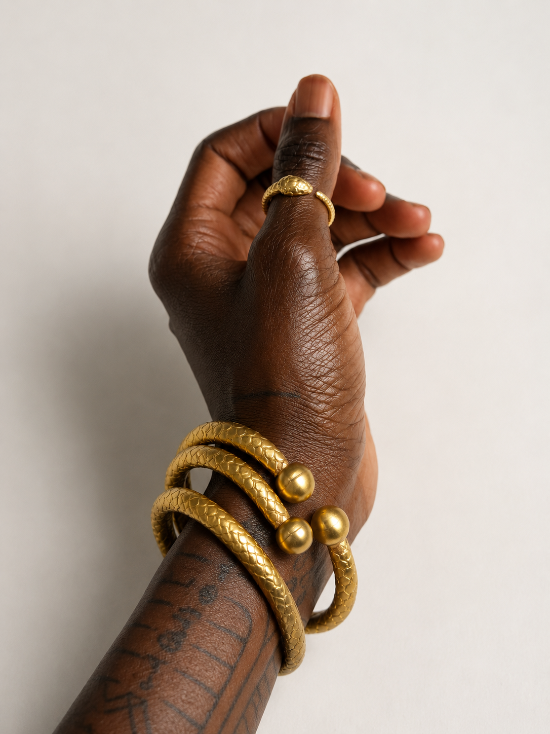 Serpent bangles