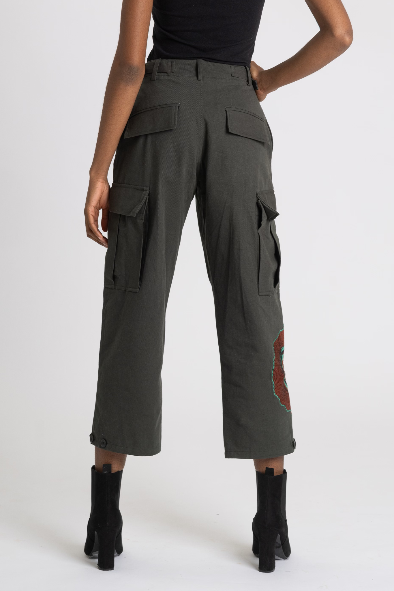 lola-faturoti-loves-pants-green-cargo-red-comet-back-closeup